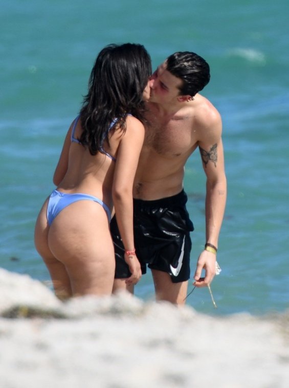 Camila Cabello in a blue bikini kisses Shawn Mendes on the beach in Miami