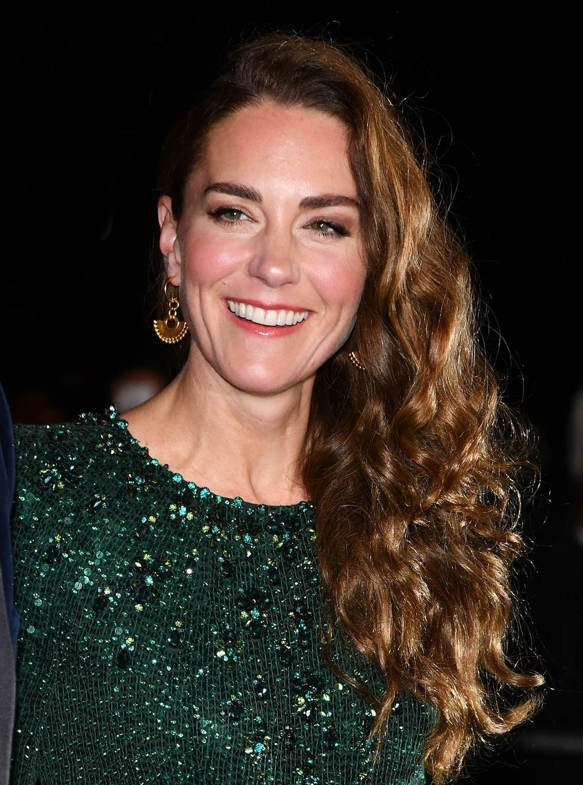 Duchess Catherine in an emerald green dress at a London event