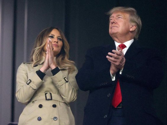 Melania Trump alongside Donald at a baseball game - A video in which "rolls her eyes" became a Twitter hit