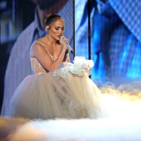 Jennifer Lopez as a bride in a creation by Dolce & Gabbana sang the song from the new movie Marry Me