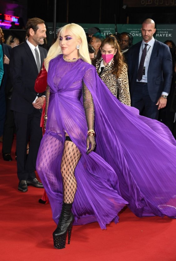 Lady Gaga strikes in a purple dress by Gucci at the premiere of House of Gucci