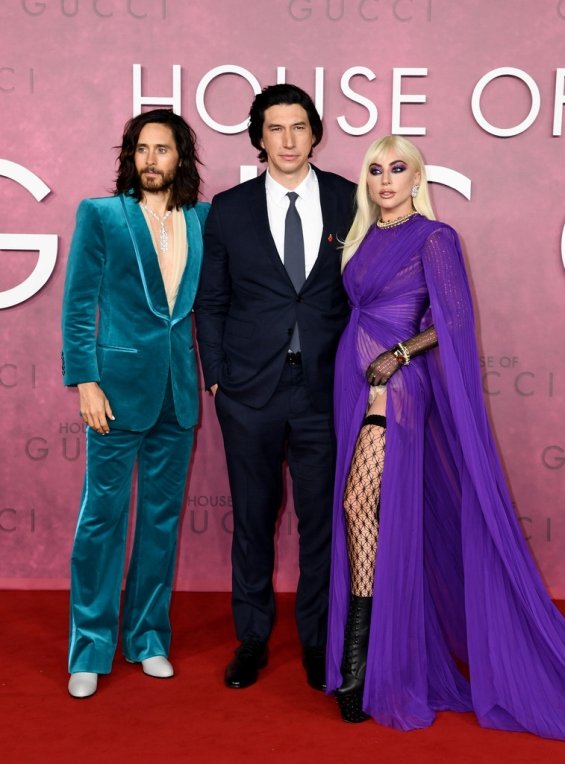 Lady Gaga strikes in a purple dress by Gucci at the premiere of House of Gucci