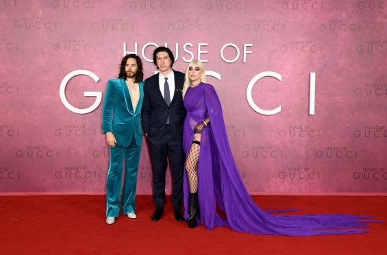 Lady Gaga strikes in a purple dress by Gucci at the premiere of House of Gucci