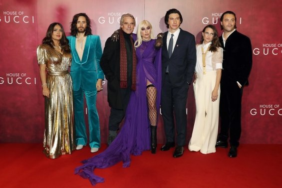 Lady Gaga strikes in a purple dress by Gucci at the premiere of House of Gucci