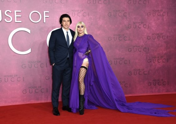 Lady Gaga strikes in a purple dress by Gucci at the premiere of House of Gucci