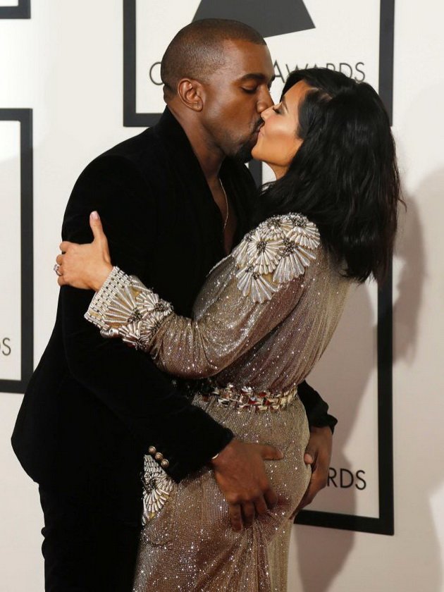 Kanye West and a new 22-year-old girl were photographed at a basketball game