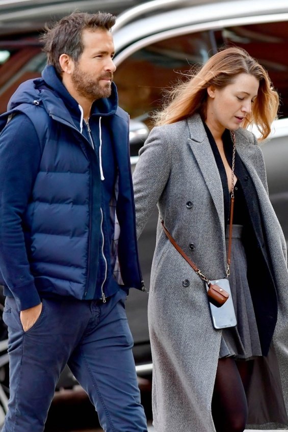 Blake Lively and Ryan Reynolds photographed on a walk with their eldest daughter