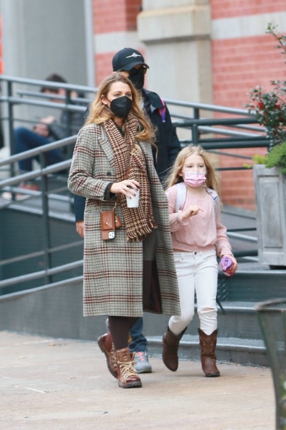 Blake Lively and Ryan Reynolds photographed on a walk with their eldest daughter