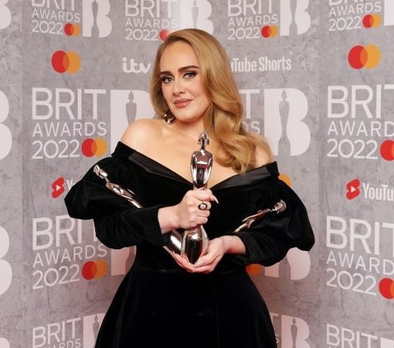 Adele at the Brit Awards with a glittering ring sparked rumors that she was engaged