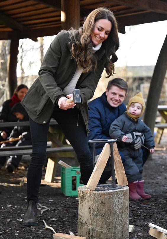 Duchess Catherine was chopping wood during a visit to a forest kindergarten in Copenhagen