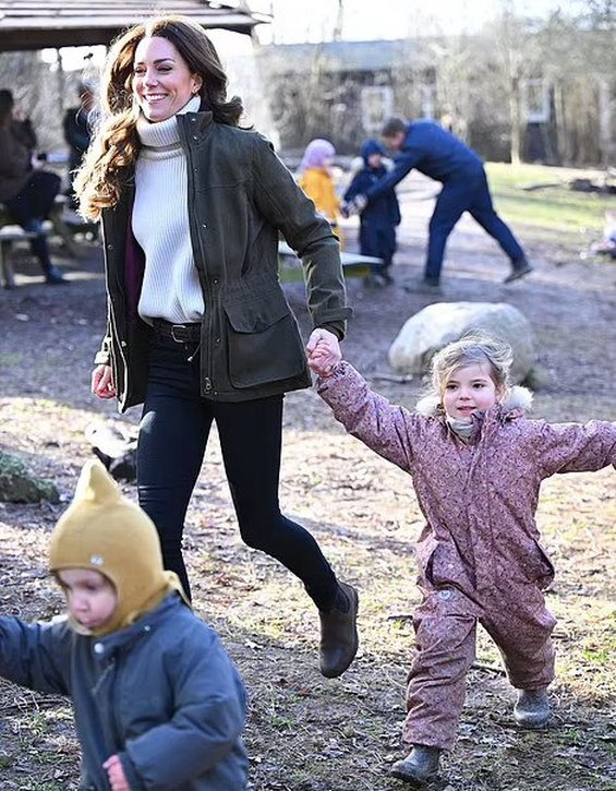 Duchess Catherine was chopping wood during a visit to a forest kindergarten in Copenhagen