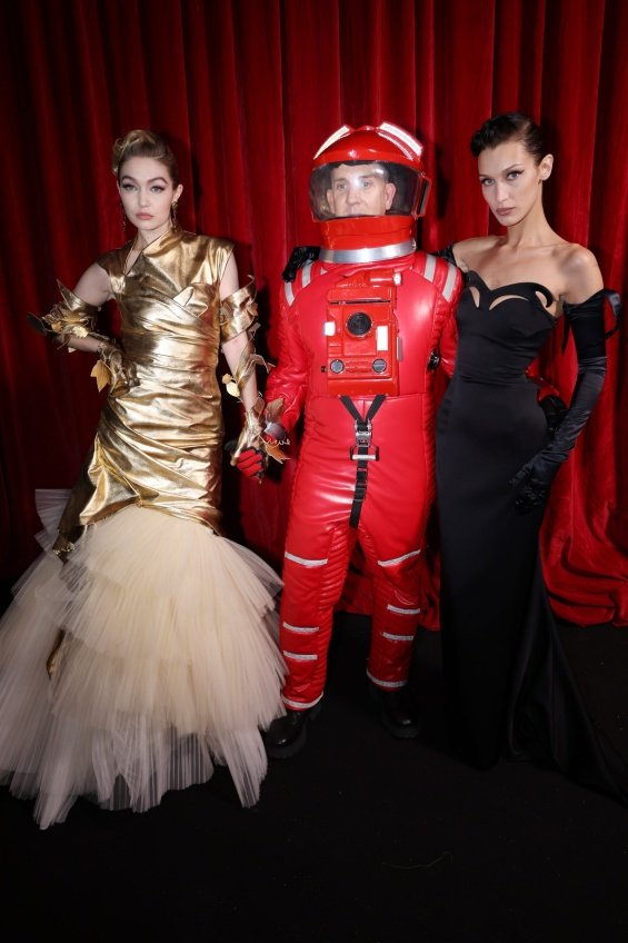 Sisters Gigi and Bella Hadid are glamorous stars at the Moschino show