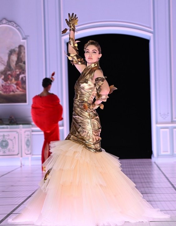 Sisters Gigi and Bella Hadid are glamorous stars at the Moschino show