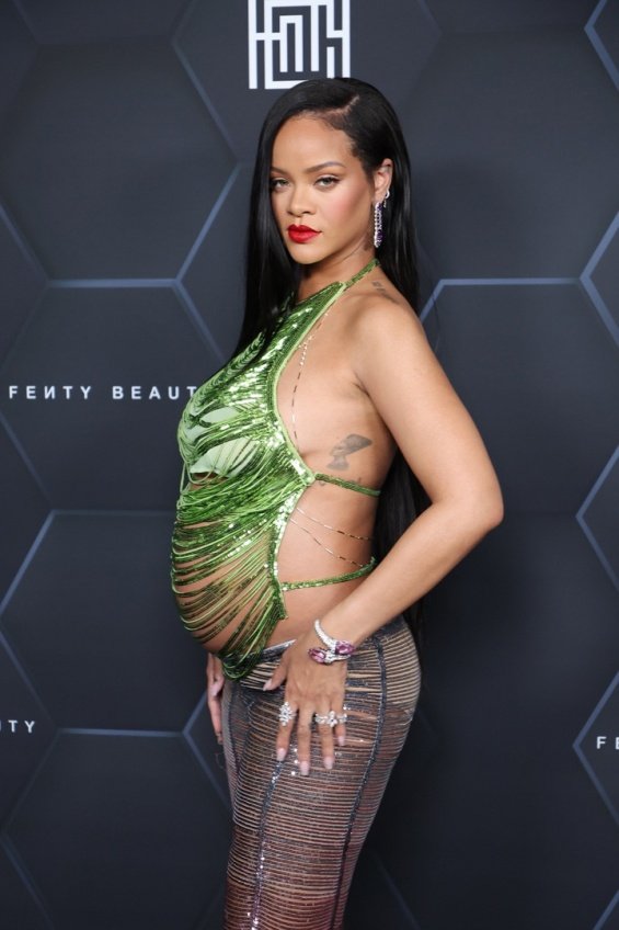 Rihanna with her beloved ASAP Rocky at an event - "I enjoy not having to hide my stomach"