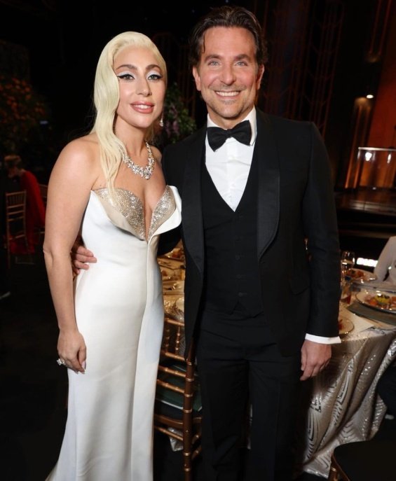 Lady Gaga in a glamorous Armani dress met Bradley Cooper at the SAG Awards