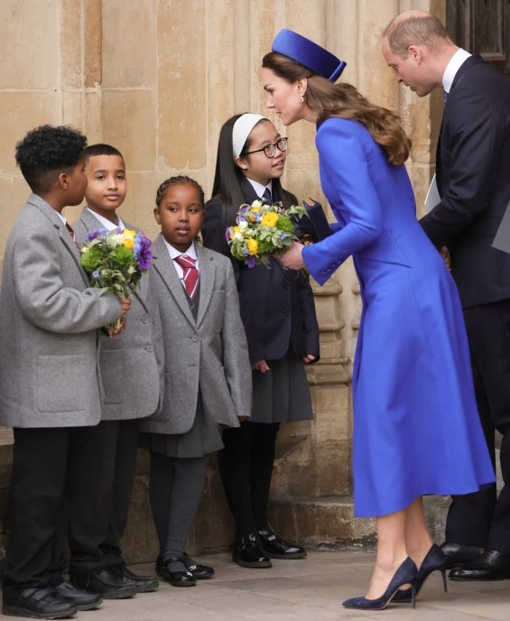 Duchess Catherine in elegant styling at a ceremony in London