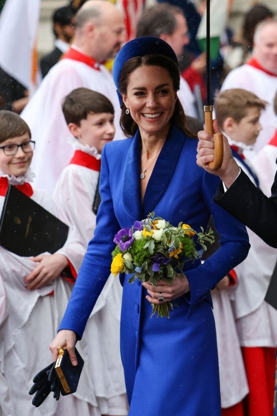 Duchess Catherine in elegant styling at a ceremony in London
