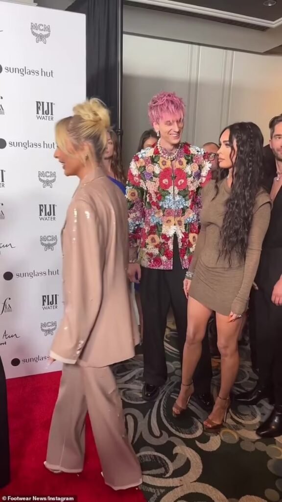 Megan Fox visibly angrily walked away from Machine Gun Kelly when he tried to kiss her (VIDEO)