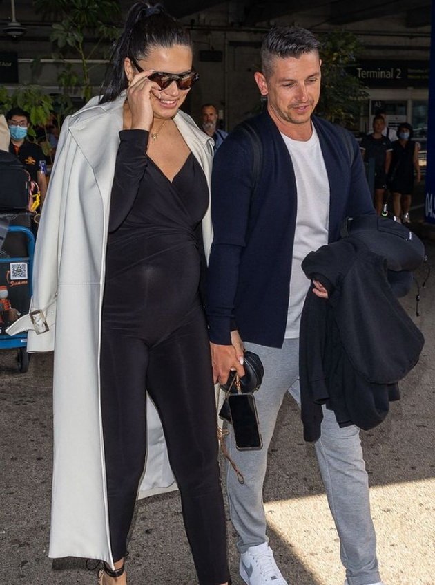 Adriana Lima arrived in Cannes in late pregnancy in a black jumpsuit