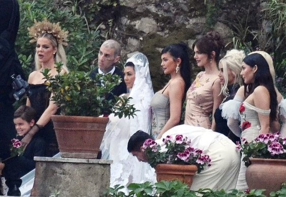 Kourtney Kardashian in a short dress from Dolce & Gabbana for the wedding with Travis Barker in Italy