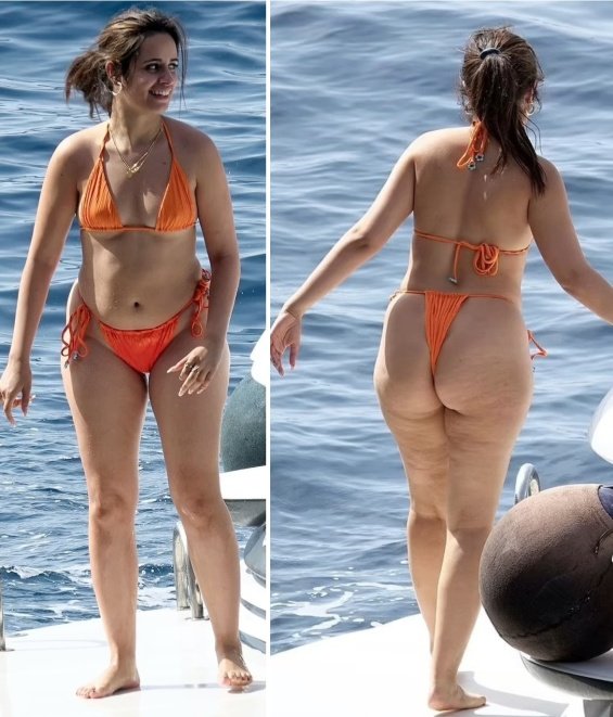 Camila Cabello in an orange bikini enjoys a yacht with friends in Positano