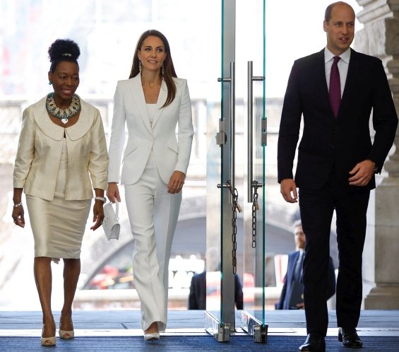 Duchess Catherine in an elegant suite at an event with Prince William