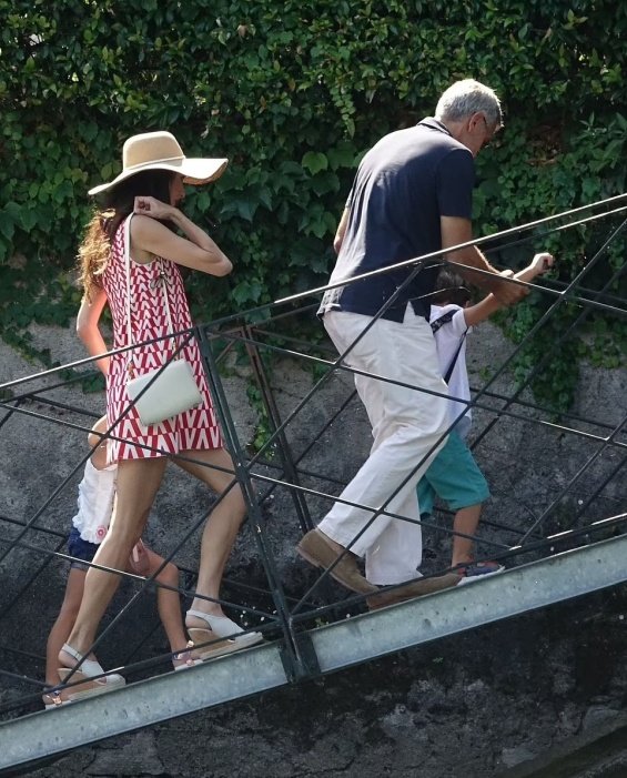 George and Amal Clooney were photographed with their little twins on vacation in Italy