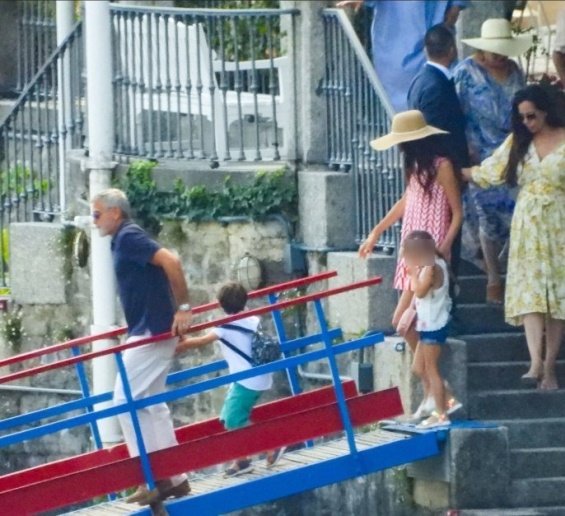 George and Amal Clooney were photographed with their little twins on vacation in Italy