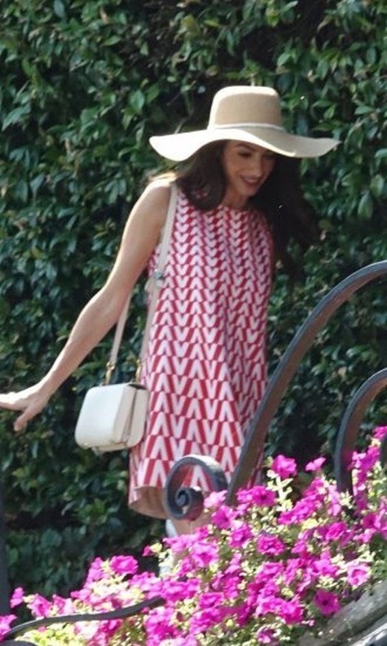 George and Amal Clooney were photographed with their little twins on vacation in Italy