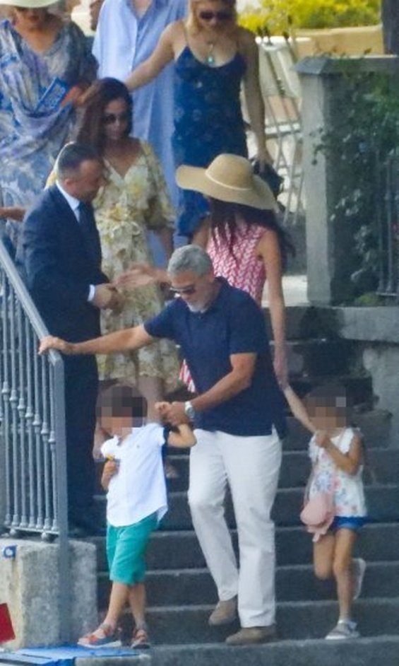 George and Amal Clooney were photographed with their little twins on vacation in Italy