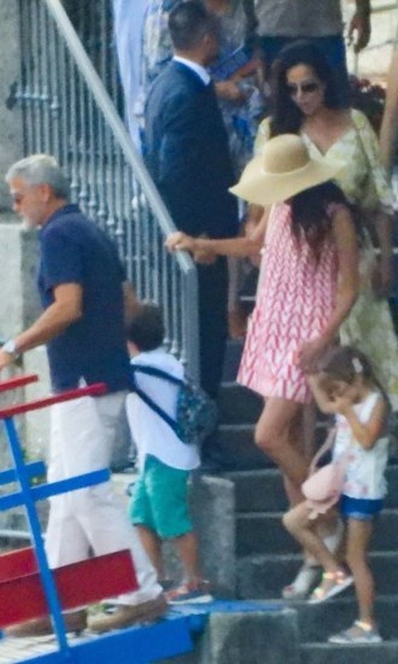 George and Amal Clooney were photographed with their little twins on vacation in Italy