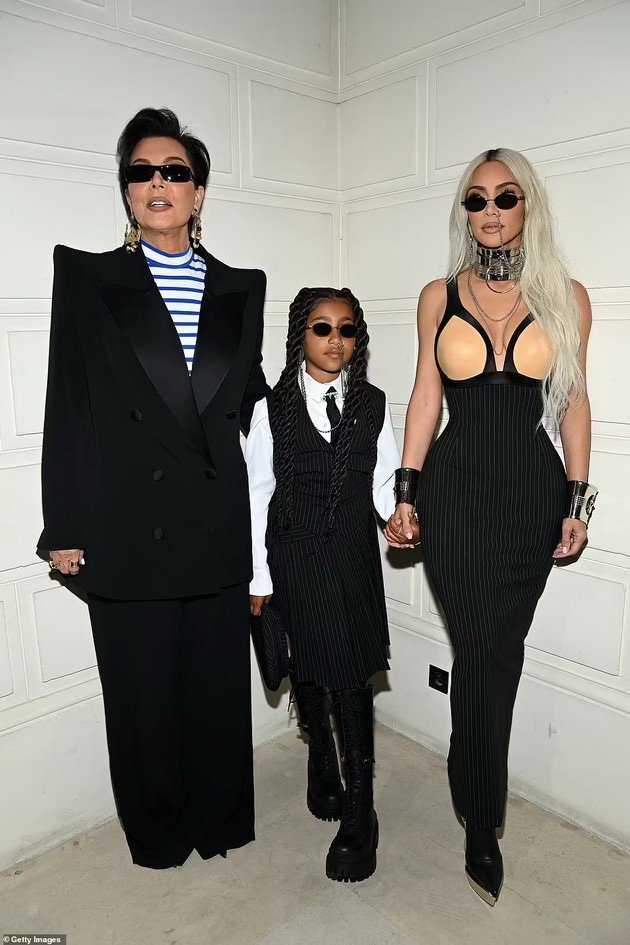 PHOTO: Kim Kardashian in bizarre styling at Fashion Week in Paris together with her daughter North