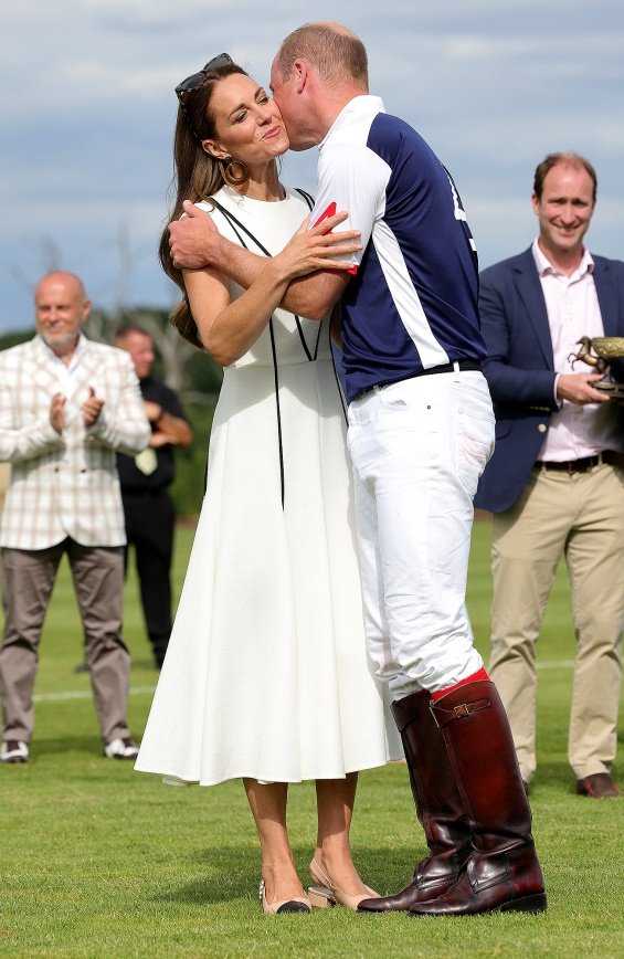 Duchess Catherine in a summery white dress cheers on Prince William at a polo match