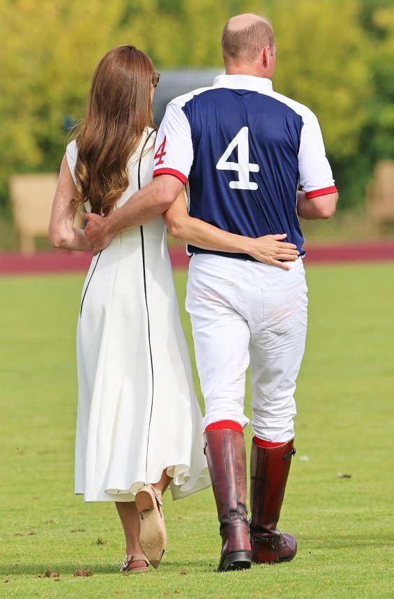 Duchess Catherine in a summery white dress cheers on Prince William at a polo match