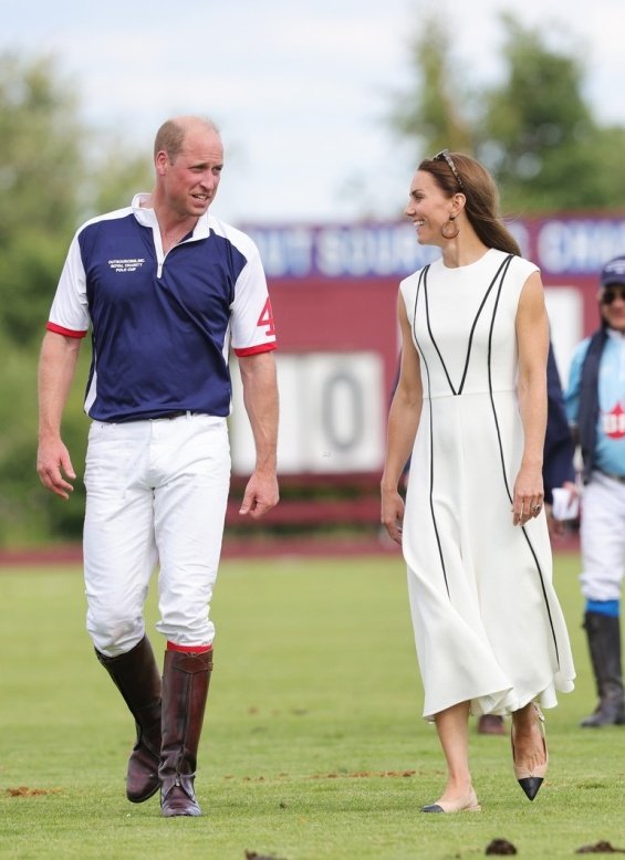 Duchess Catherine in a summery white dress cheers on Prince William at a polo match