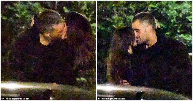 Emily Ratajkowski was photographed passionately kissing an unknown man