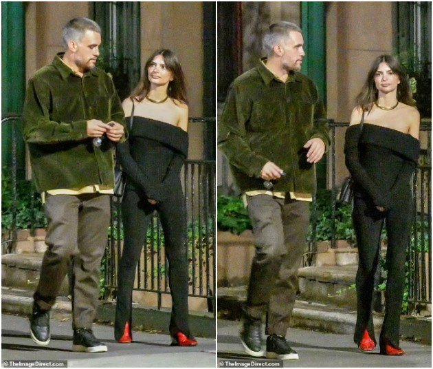 Emily Ratajkowski was photographed passionately kissing an unknown man