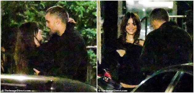 Emily Ratajkowski was photographed passionately kissing an unknown man