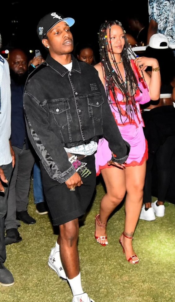 Rihanna in a miniskirt in the arms of ASAP Rocky at a music festival in Barbados