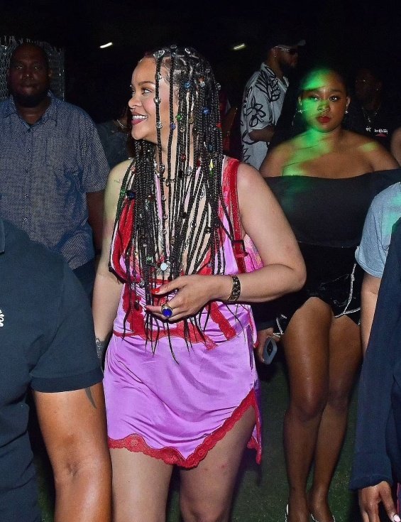 Rihanna in a miniskirt in the arms of ASAP Rocky at a music festival in Barbados