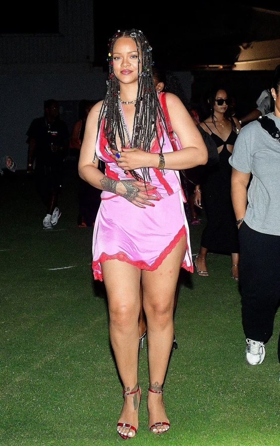 Rihanna in a miniskirt in the arms of ASAP Rocky at a music festival in Barbados