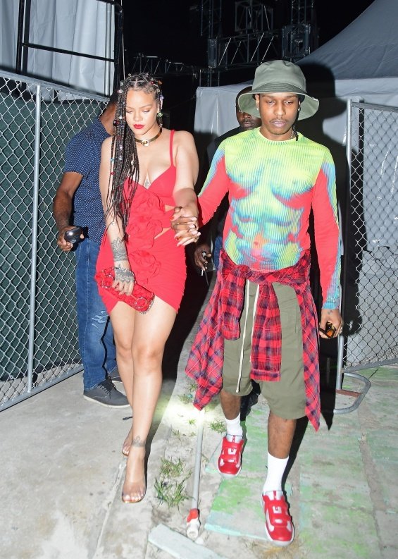 Rihanna in a miniskirt in the arms of ASAP Rocky at a music festival in Barbados