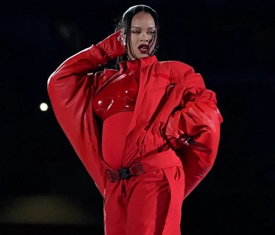 Rihanna reveals she's pregnant with a second child by showing pregnant belly at Super Bowl performance