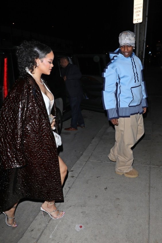 Pregnant Rihanna in a mini dress at a birthday dinner with ASAP Rocky