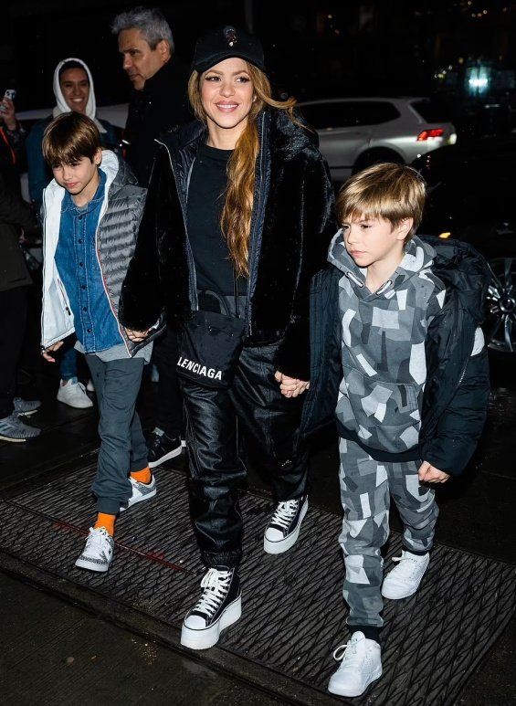 Shakira holding hands with her sons Sasha and Milan in New York