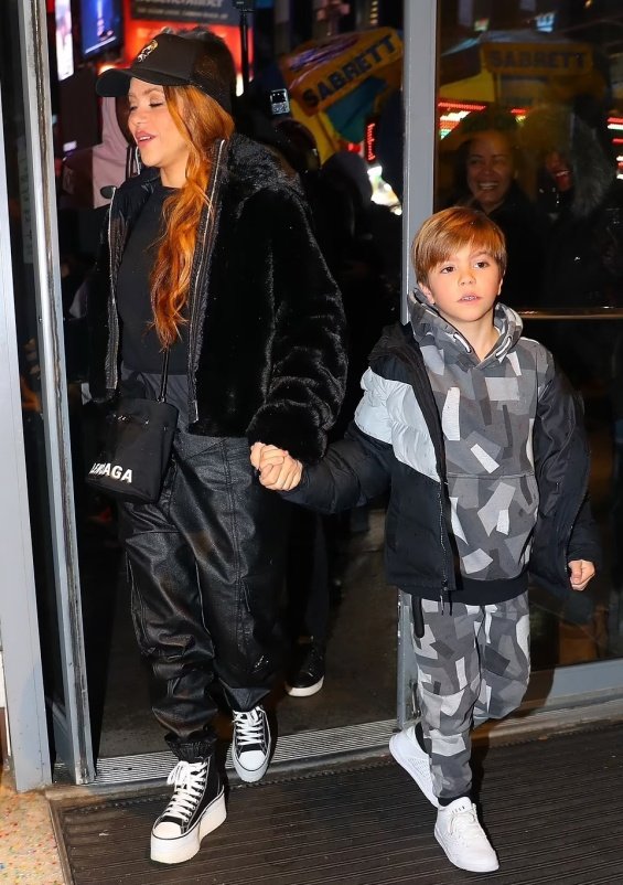 Shakira holding hands with her sons Sasha and Milan in New York