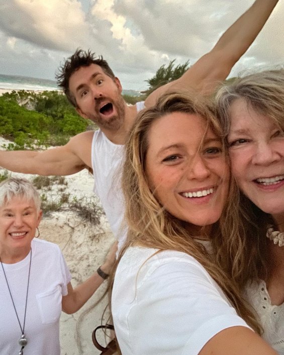 Blake Lively with Ryan Reynolds on the beach two months after the birth of their fourth child