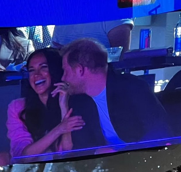 Meghan Markle and Harry relaxed and in love at a basketball game, while Kate Middleton performs Royal duties