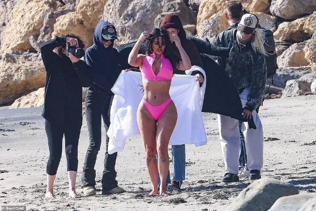 PHOTO: Kim Kardashian poses in a thong bikini