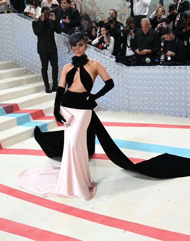 Jennifer Lopez is under fire for teaching photographers how to get the perfect shot at the Met Gala 2023